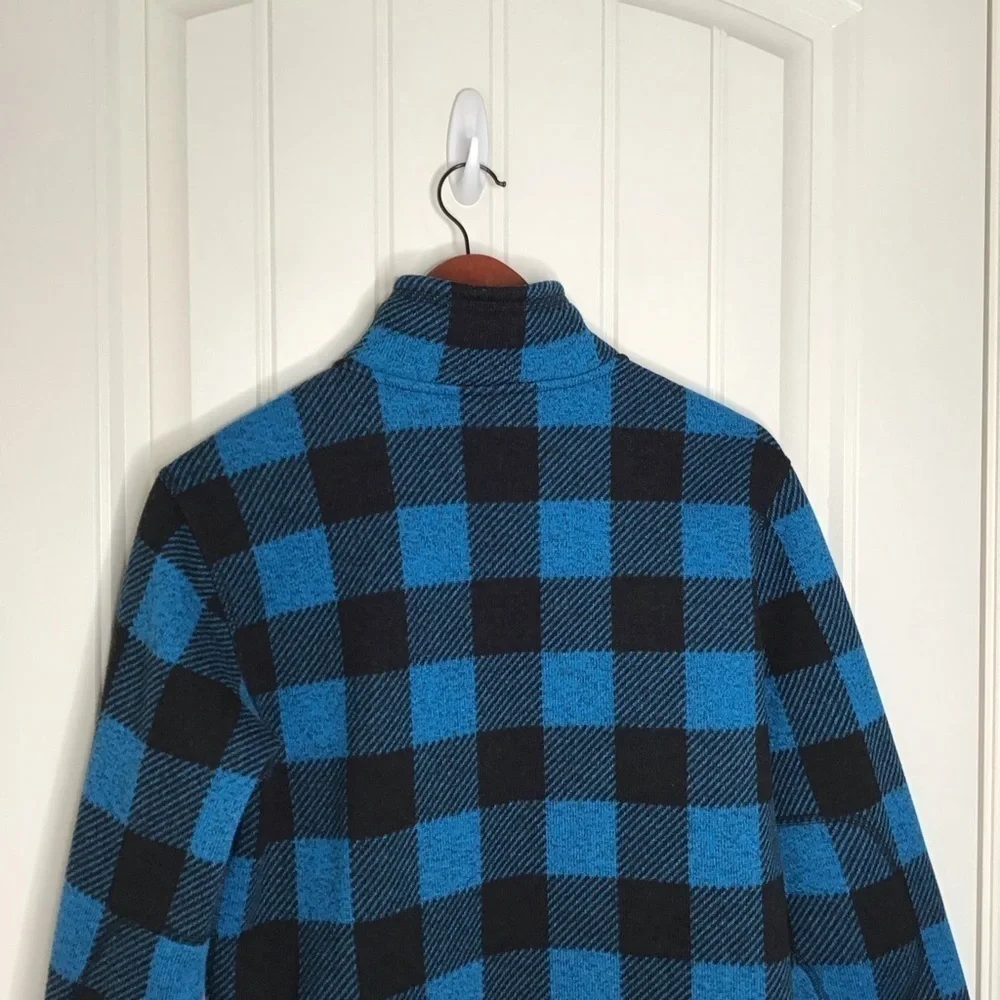 The North Face Men's Novelty Gordon Lyon 1/4 Zip Fleece Pullover in Blue Plaid.